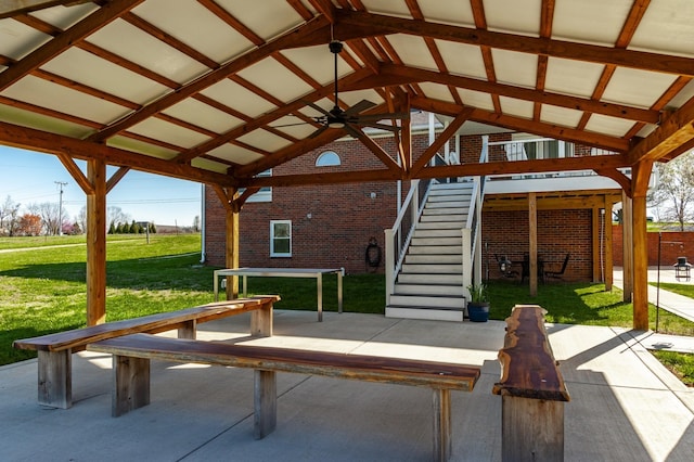 view of patio with stairway