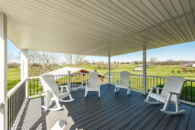 wooden deck with a yard