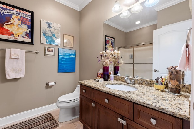 bathroom with ornamental molding, a shower stall, vanity, tile patterned flooring, and baseboards