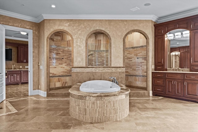 bathroom with walk in shower, a garden tub, vanity, and crown molding