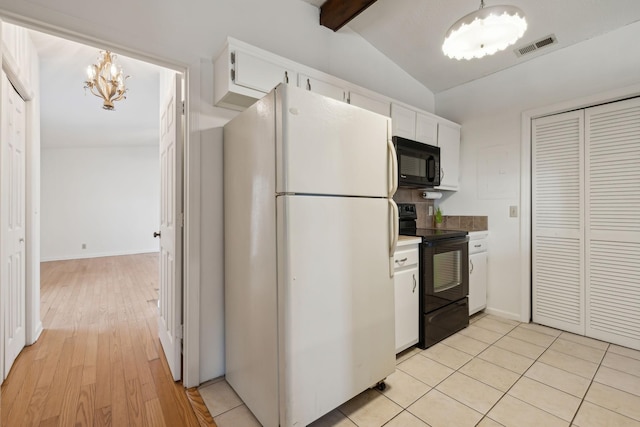 kitchen with vaulted ceiling with beams, black appliances, white cabinets, and a notable chandelier