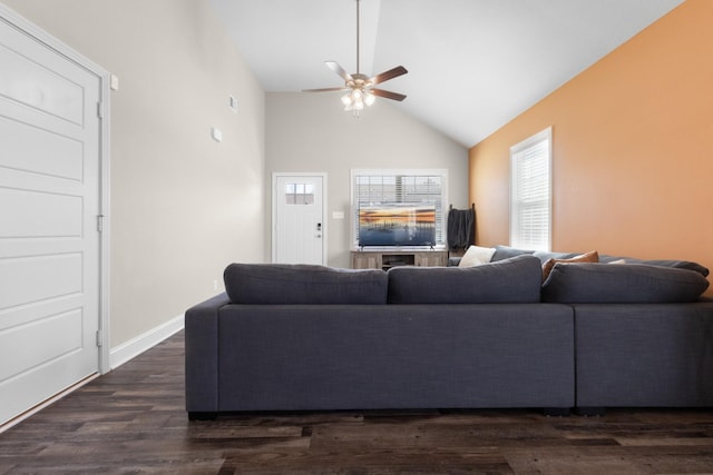 living room featuring high vaulted ceiling, dark wood-type flooring, a ceiling fan, and baseboards