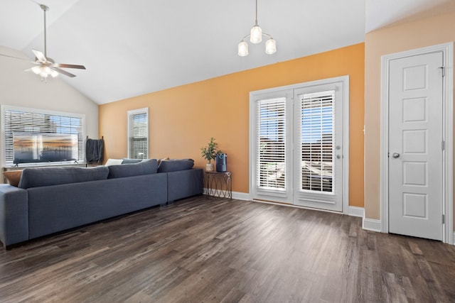 living area with dark wood-style floors, ceiling fan, baseboards, and high vaulted ceiling