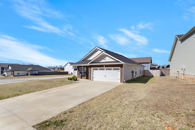 view of front of property with a garage, brick siding, fence, driveway, and a front lawn