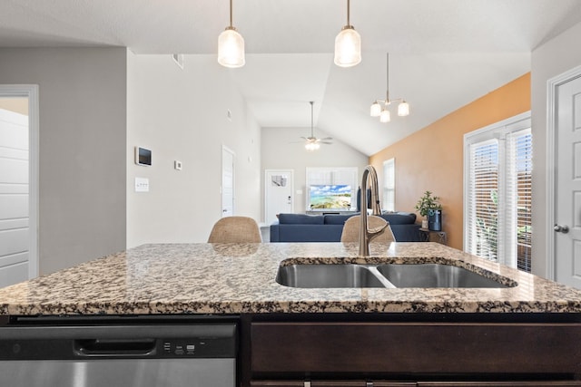 kitchen featuring light stone counters, a sink, vaulted ceiling, open floor plan, and dishwasher