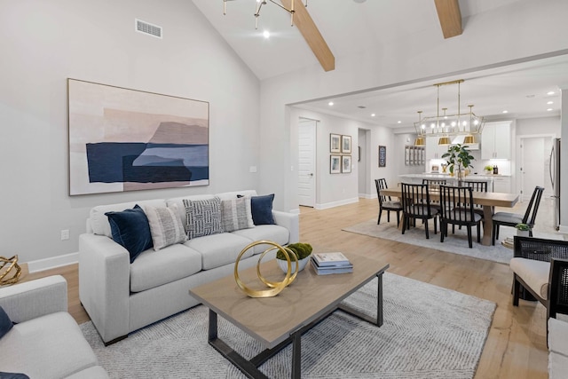 living area with high vaulted ceiling, recessed lighting, visible vents, baseboards, and light wood-style floors