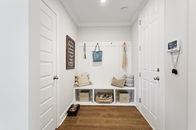 mudroom with ornamental molding and wood finished floors