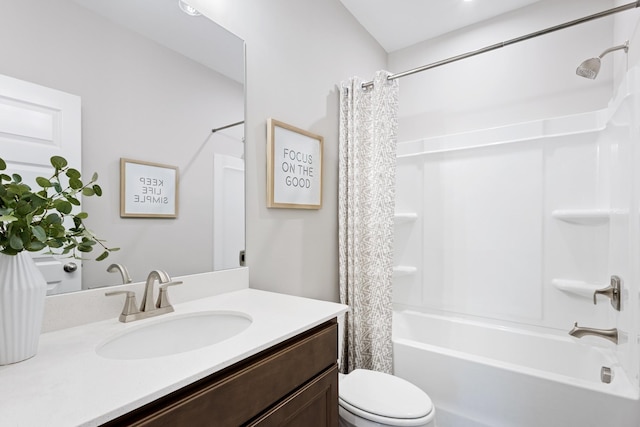 bathroom with shower / bathtub combination with curtain, toilet, and vanity