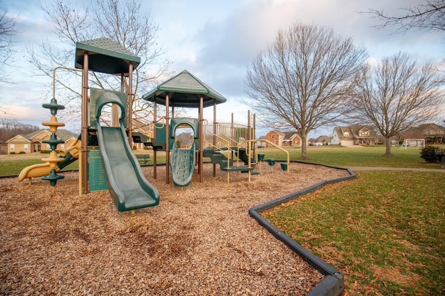 community playground featuring a yard