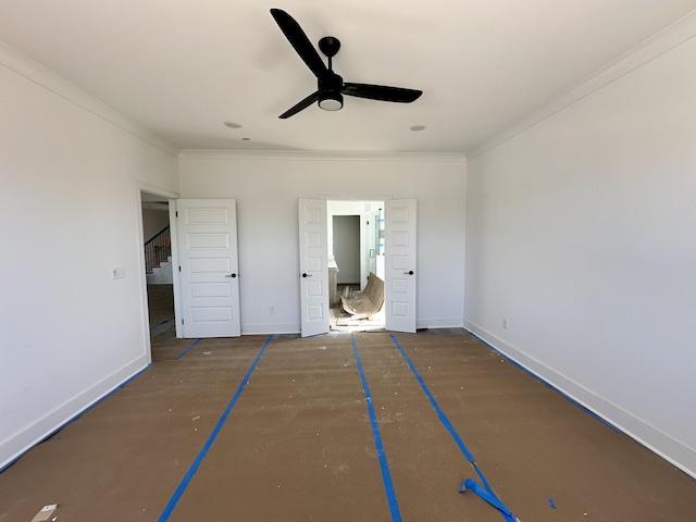 unfurnished bedroom featuring a ceiling fan, crown molding, and baseboards