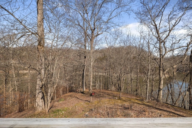 exterior space featuring a view of trees