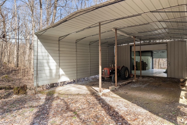 view of parking featuring a detached carport