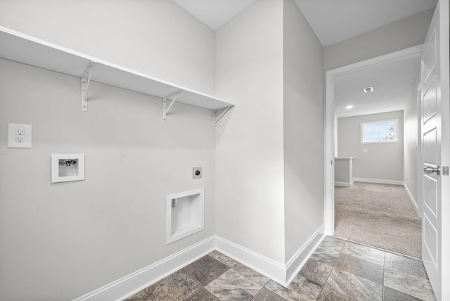 laundry room featuring hookup for a washing machine, hookup for an electric dryer, laundry area, baseboards, and stone finish floor