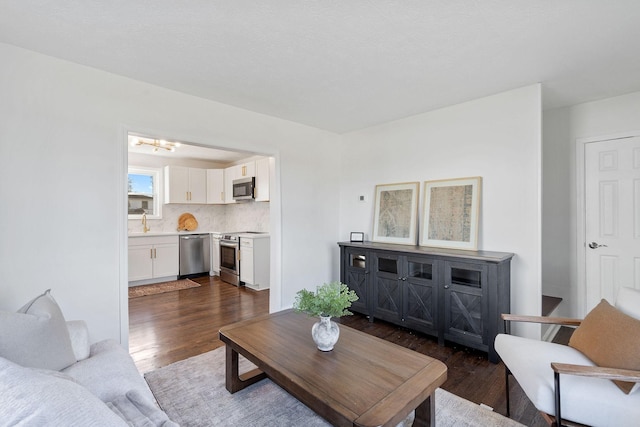 living room featuring dark wood finished floors