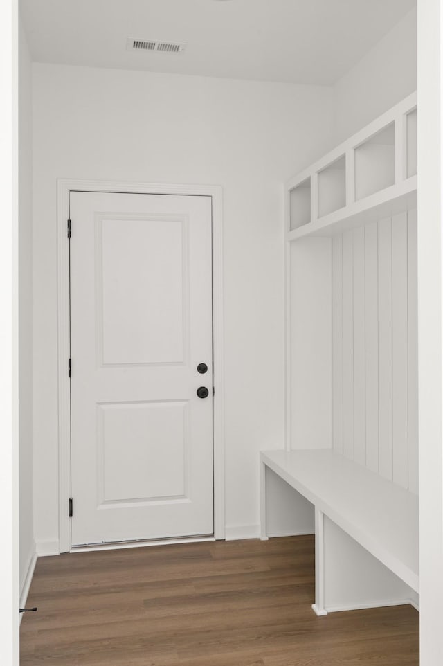 mudroom featuring wood finished floors and visible vents