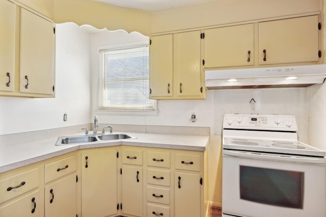 kitchen with under cabinet range hood, light countertops, white electric range oven, and a sink