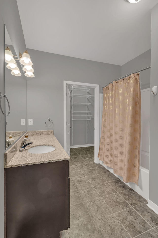 full bath featuring tile patterned flooring and vanity