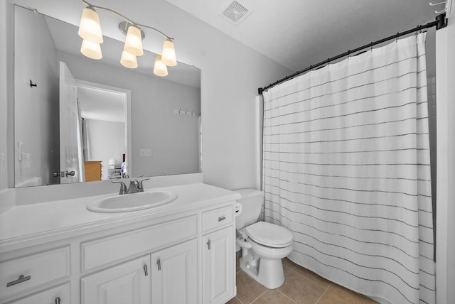 bathroom featuring tile patterned flooring, toilet, vanity, visible vents, and a shower with curtain