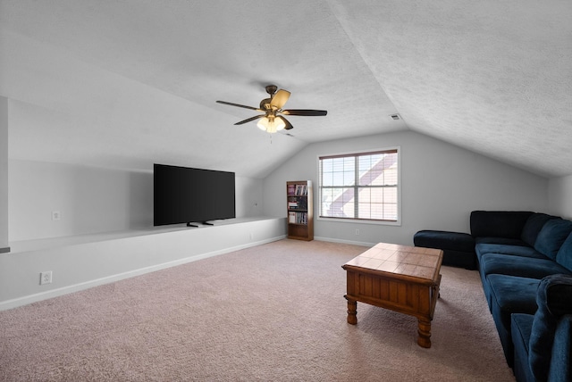 carpeted living room featuring a textured ceiling, visible vents, a ceiling fan, vaulted ceiling, and baseboards