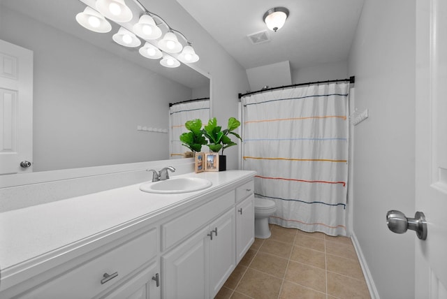 full bath with visible vents, baseboards, toilet, tile patterned flooring, and vanity