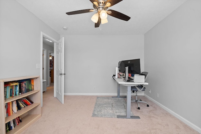 office with ceiling fan, carpet flooring, and baseboards