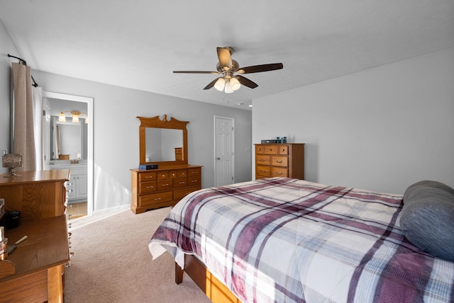 bedroom with light carpet and ceiling fan