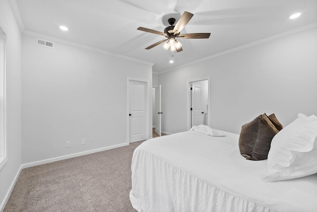 bedroom featuring baseboards, visible vents, carpet flooring, and ornamental molding