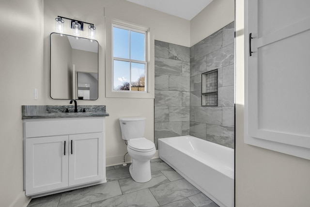 full bathroom featuring baseboards, toilet,  shower combination, marble finish floor, and vanity