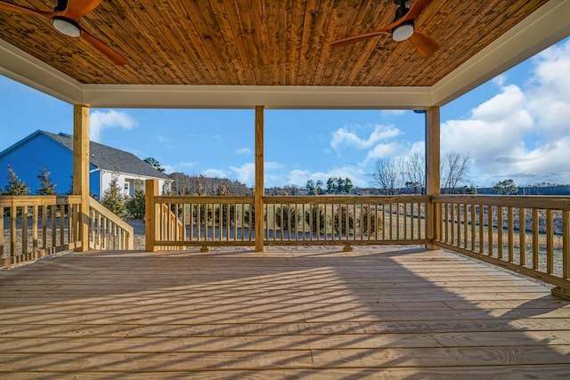 wooden terrace featuring ceiling fan