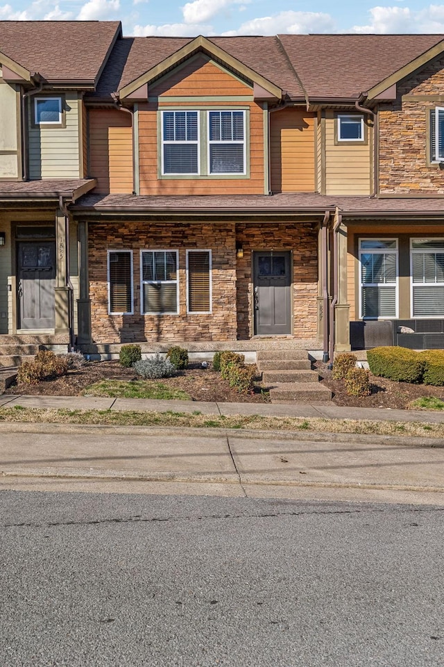 view of front of property with stone siding