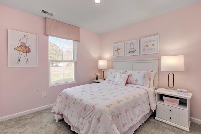 carpeted bedroom with visible vents and baseboards