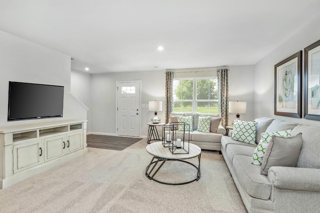 carpeted living room with baseboards and recessed lighting