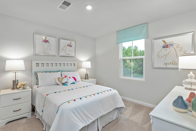 bedroom featuring light carpet, visible vents, and baseboards