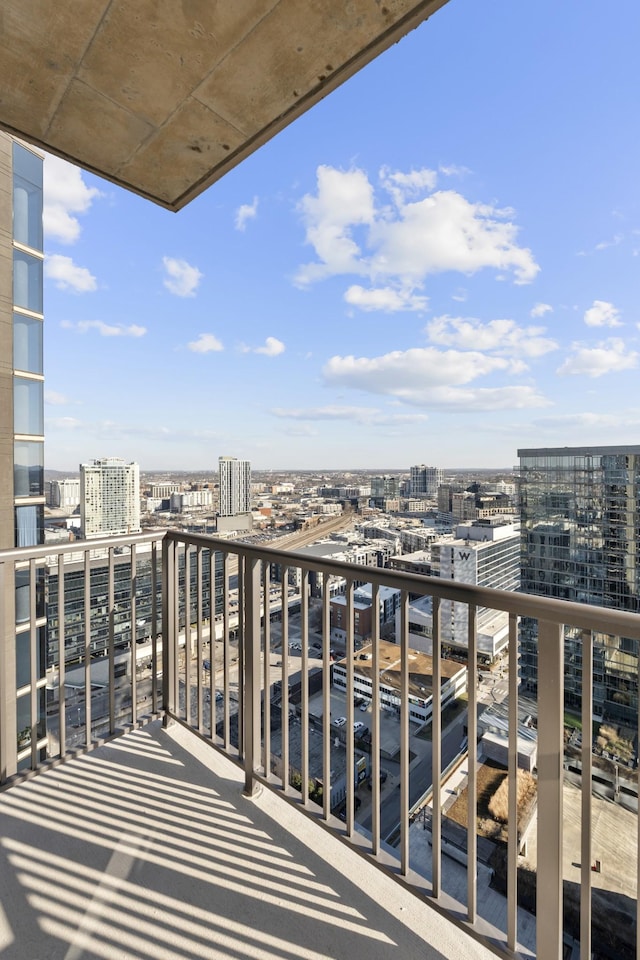 balcony featuring a city view