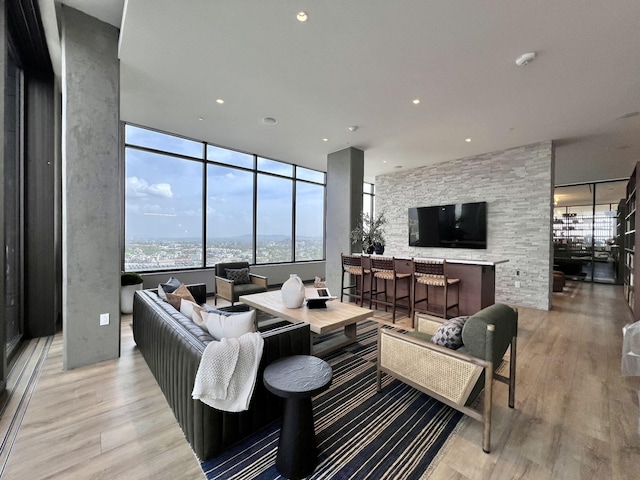 living room featuring recessed lighting and light wood-style floors