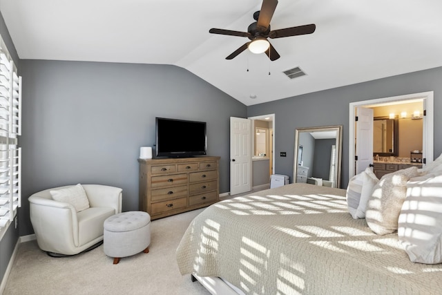 bedroom with lofted ceiling, baseboards, visible vents, and carpet flooring