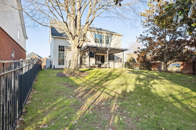 back of property featuring a fenced backyard, a patio, a pergola, and a yard