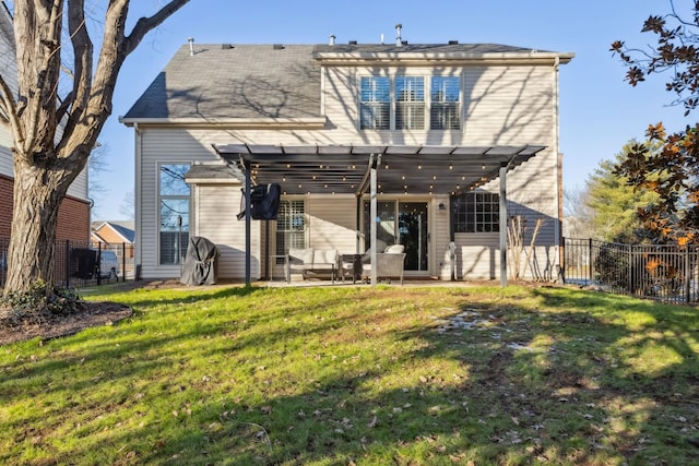 rear view of property featuring a patio area, a lawn, fence, and a pergola