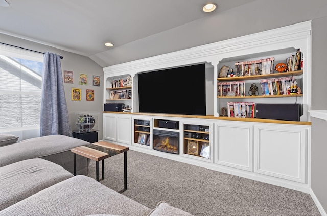 living area with lofted ceiling, carpet, built in shelves, and recessed lighting