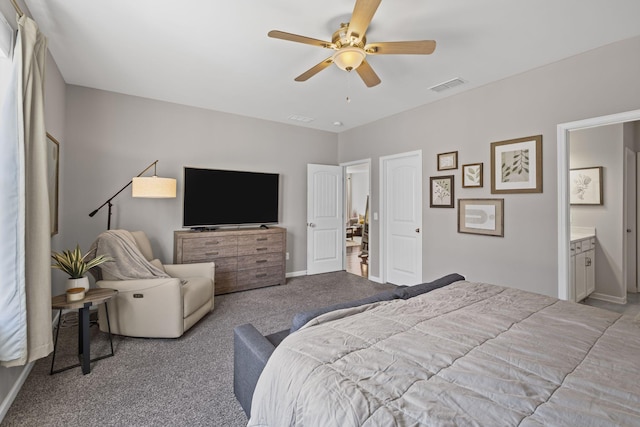 bedroom with visible vents, carpet flooring, connected bathroom, ceiling fan, and baseboards