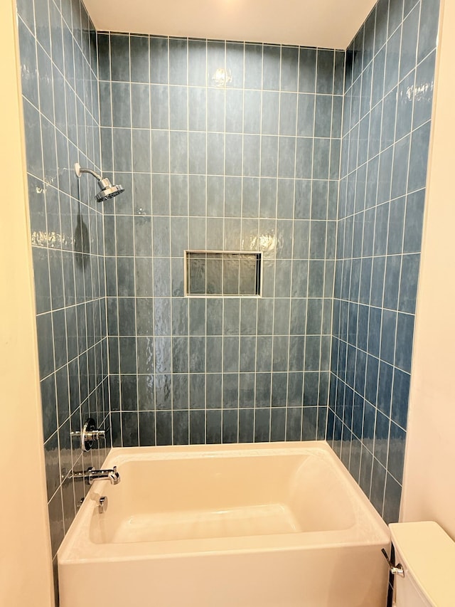 bathroom with toilet and shower / washtub combination