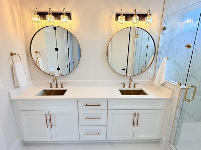 full bathroom with marble finish floor, double vanity, a sink, and a marble finish shower