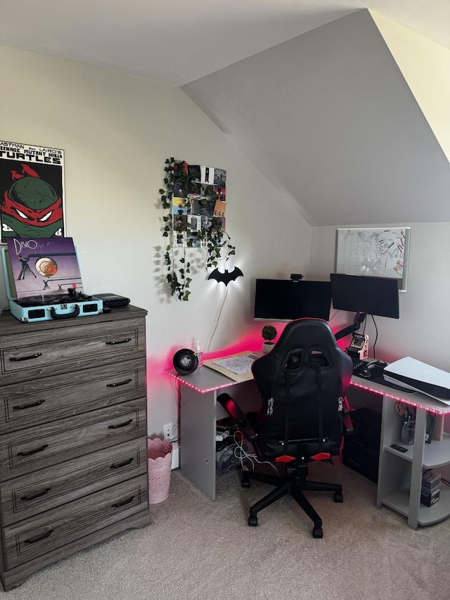 office featuring lofted ceiling and carpet flooring