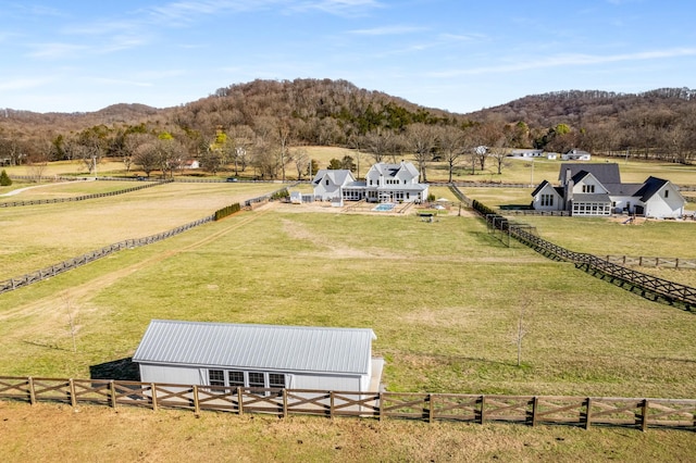 aerial view featuring a rural view and a mountain view