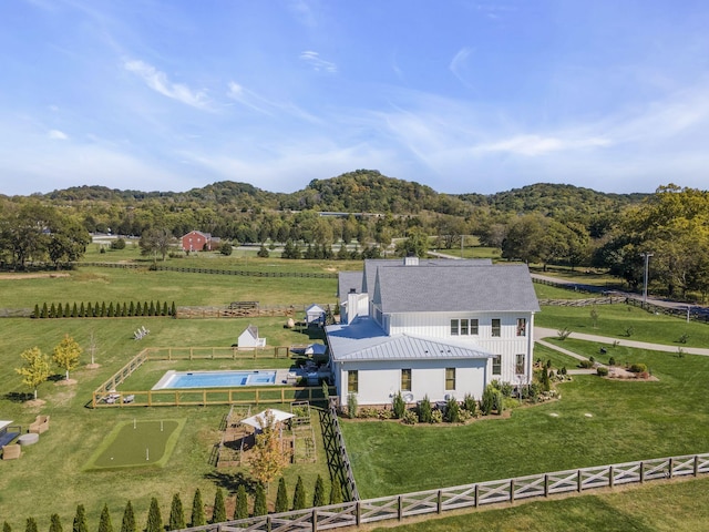 aerial view featuring a rural view and a mountain view