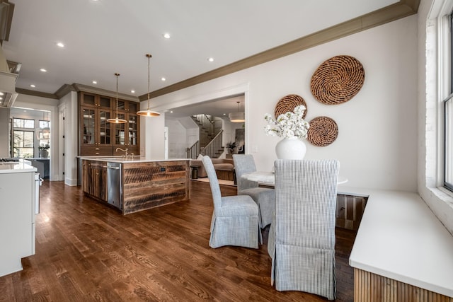 interior space featuring stairs, ornamental molding, dark wood-style flooring, and recessed lighting