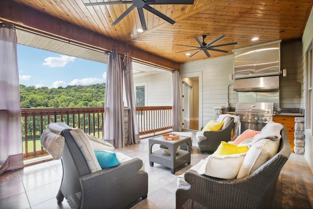 living area with wooden walls, recessed lighting, wood ceiling, a ceiling fan, and tile patterned floors