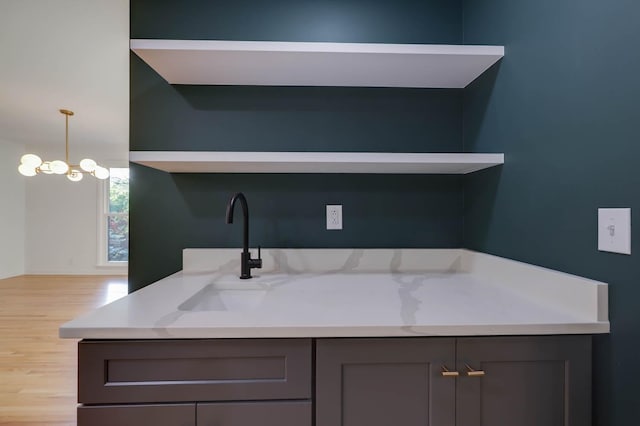 interior space featuring vanity and wood finished floors