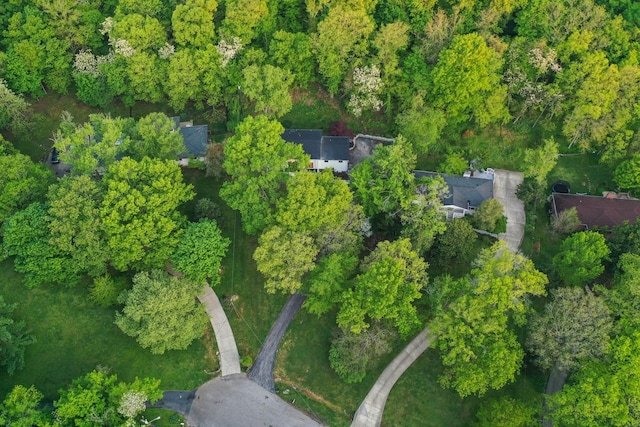 drone / aerial view with a view of trees