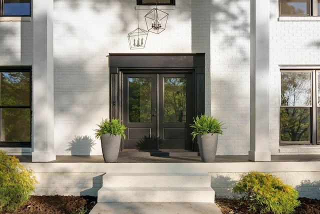 entrance to property with french doors and covered porch